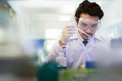 Man-holding-pipette.jpg